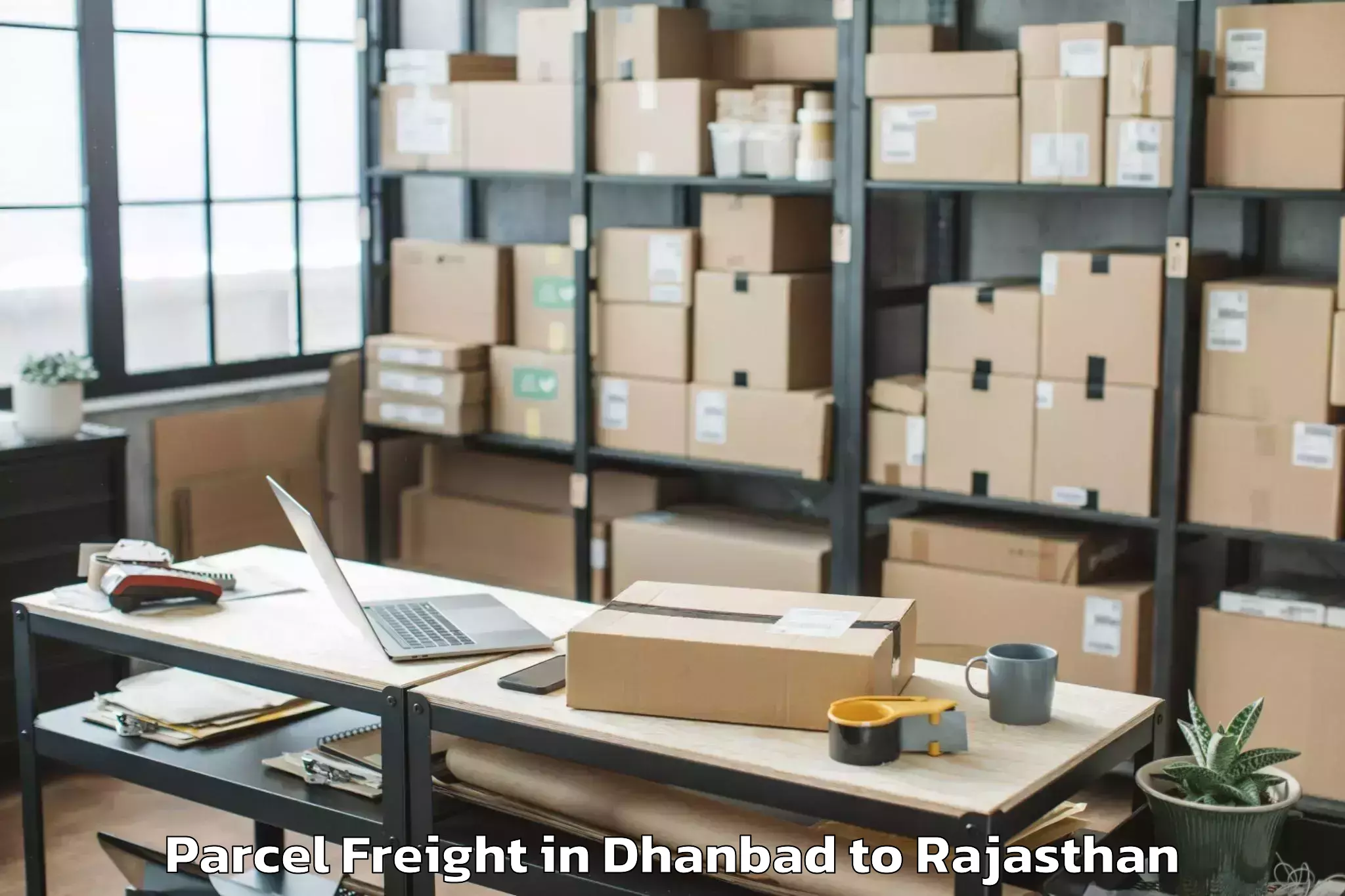 Easy Dhanbad to Chomu Parcel Freight Booking